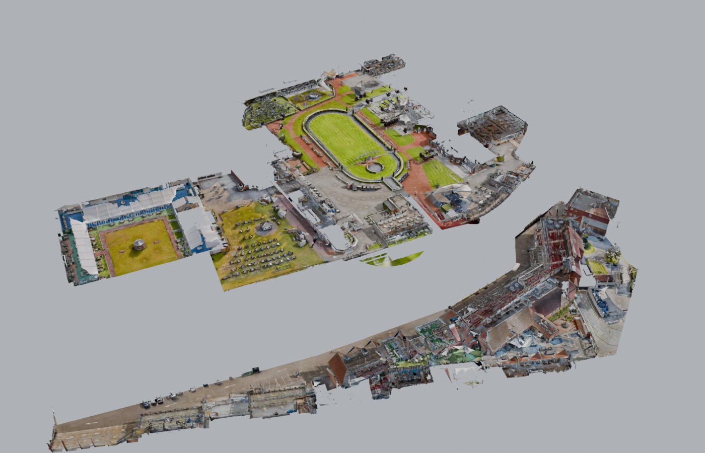 An isolated oblique view of the Matterport scan of the racecourse buildings and paddock, floating on a grey background