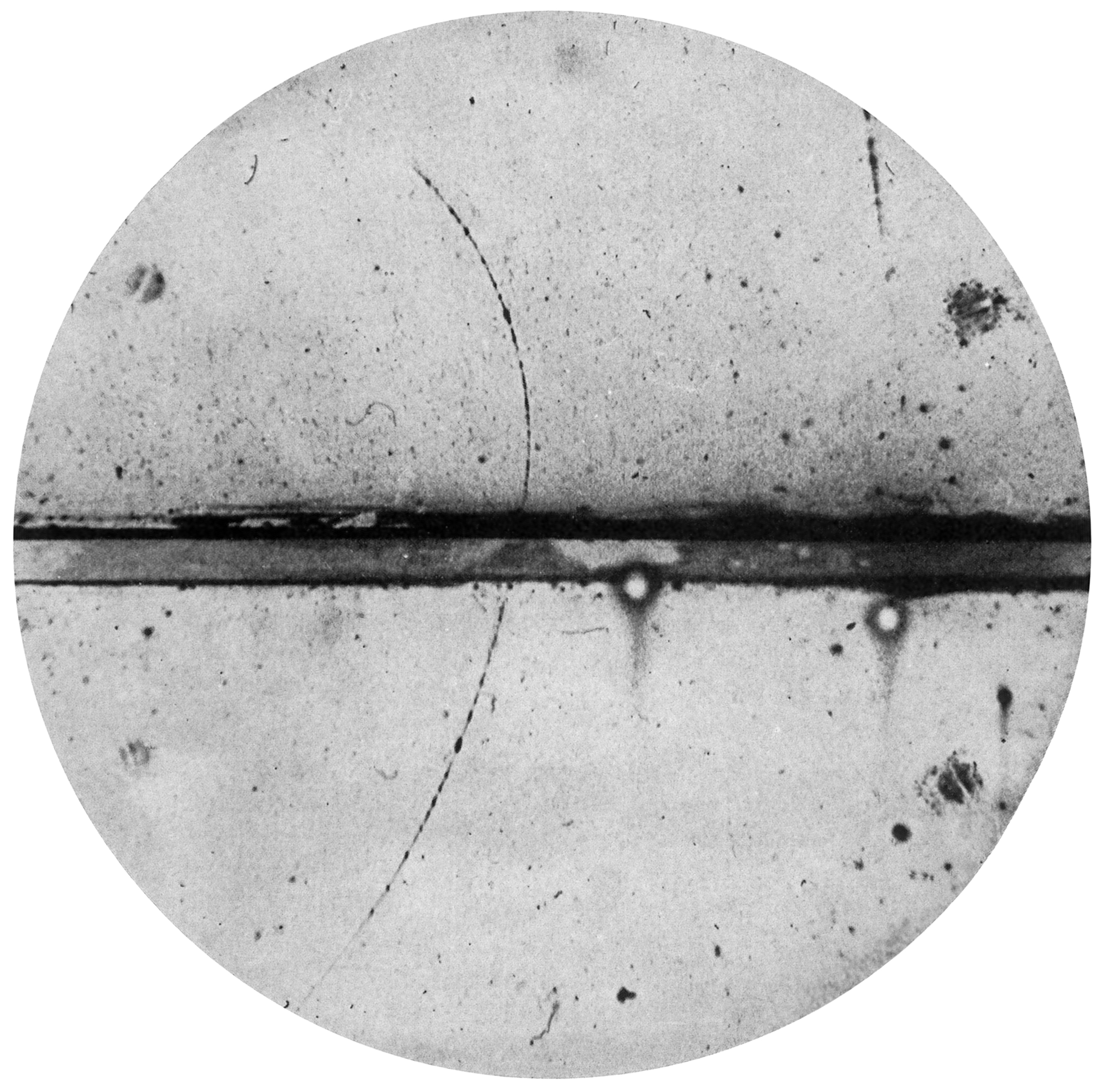 Carl Anderson's 1932 cloud chamber photograph showing the curved track of the first observed positron